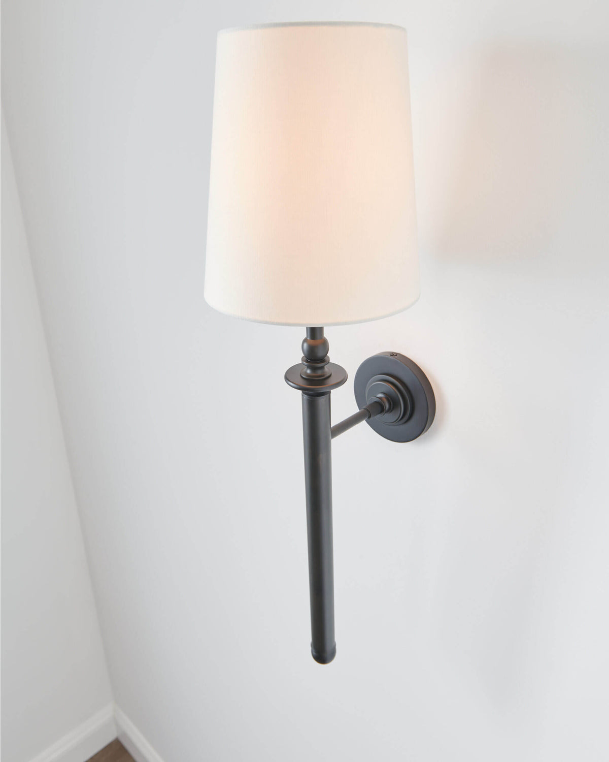 GENERATION LIGHTING  Capri Tail Sconce Aged Iron TW1021AI