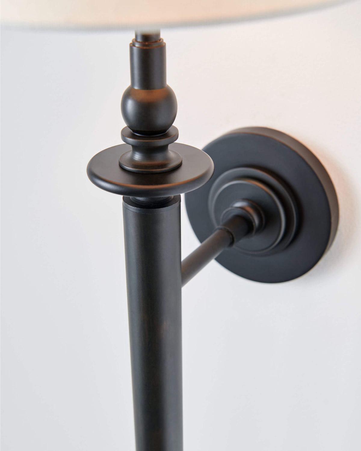 GENERATION LIGHTING  Capri Tail Sconce Aged Iron TW1021AI