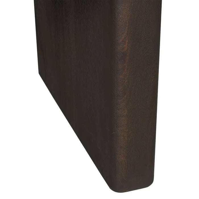 Close-up of a dark brown wooden furniture piece showing the corner and side grain against a plain white background.