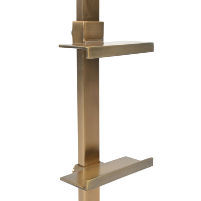 A modern wall-mounted two-tier shelf in a brushed brass or bronze finish, shown against a plain white background.